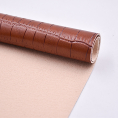 Material de rollo de cuero de PVC con patrón en relieve de piedra clásica para bolso