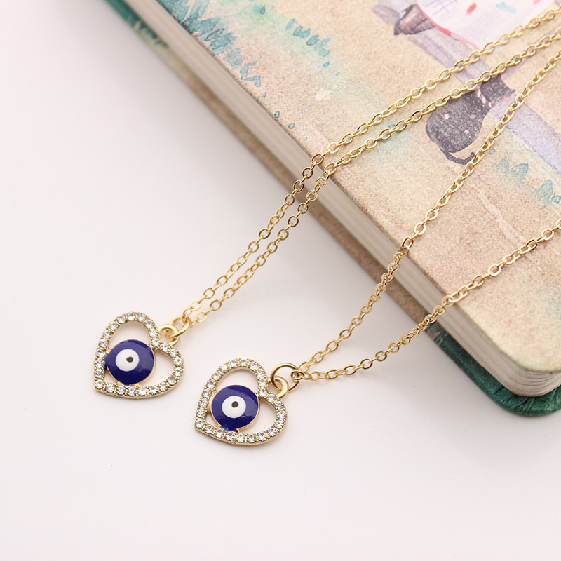 Fashion alloy gold plated chain blue eyes diamond necklace jewelry long inlaid heart evil eyes necklace for women
