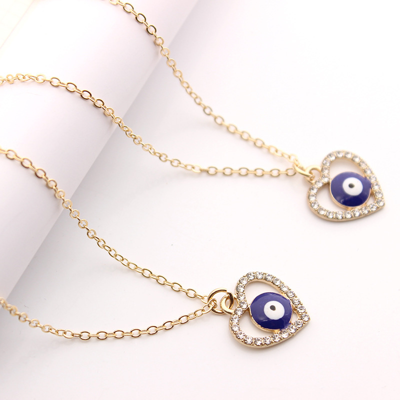 Fashion alloy gold plated chain blue eyes diamond necklace jewelry long inlaid heart evil eyes necklace for women