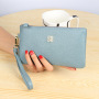First layer cowhide 2020 new women's zipper European and American long large banknote wallet wallet leather hand bag